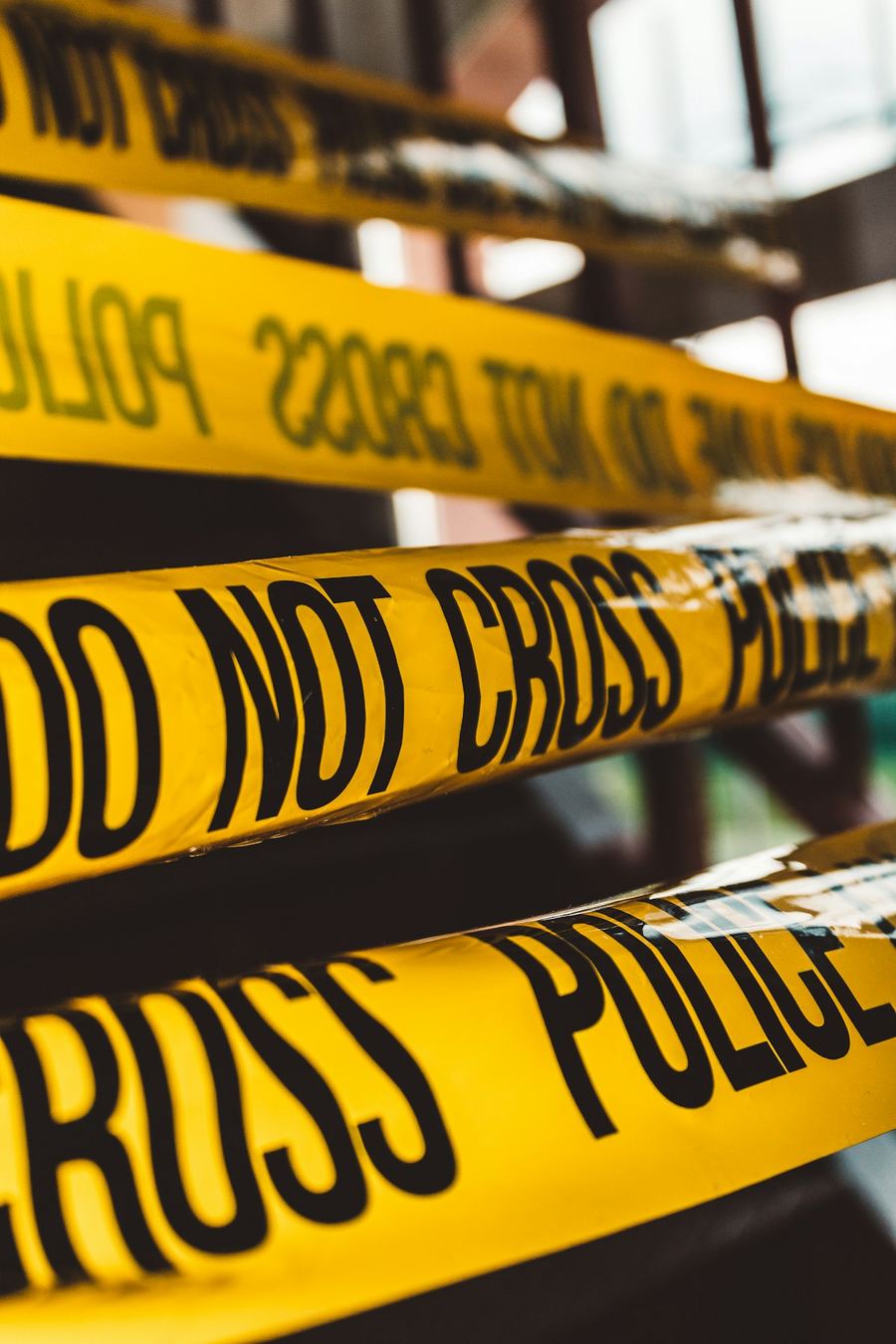 Police barricade tape marking a secured evidence scene